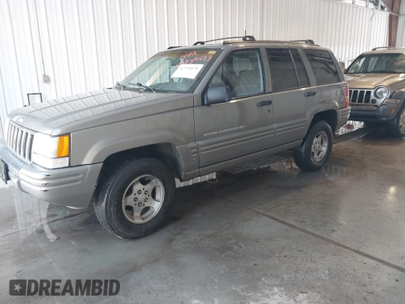 1998 Jeep Grand Cherokee Laredo with VIN 1J4GZ48S4WC262249, listed as a IAAI auction lot 42739473 with 94,094 mi miles and . Bid and sale history available at DreamBid. Image 2.