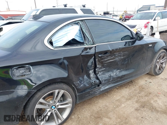 2013 BMW 1 Series 128i with VIN WBAUP7C52DVP24985, listed as a IAAI auction lot 41368682 with 107,294 mi miles and . Bid and sale history available at carsss.com. Image 6.
