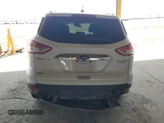 2016 Ford Escape Titanium with VIN 1FMCU9J91GUA11090, listed as a Copart auction lot 54231675 with 135,735 mi miles and Salvage Title. Bid and sale history available at DreamBid. Image 6.