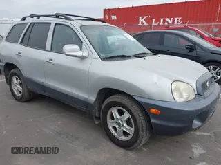 2003 Hyundai Santa Fe LX with VIN KM8SC73E83U568666, listed as a IAAI auction lot 41679044 with 127,560 mi miles. Bid and sale history available at carsss.com. Image 6.
