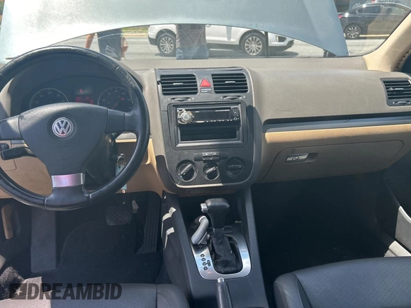2006 Volkswagen Jetta z VIN 3VWRG81K46M724245, wystawiony jako Copart lot #57293785 z przebiegiem 212 639 mil mil oraz Czysty tytuł • Clean title. Historia ofert i sprzedaży dostępna na DreamBid. Obrazek 9.