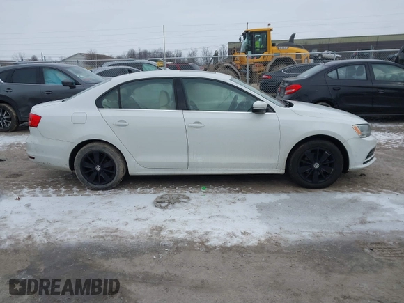 2015 Volkswagen Jetta Sedan 1.8T SE w/Connectivity with VIN 3VWD07AJXFM324240, listed as a IAAI auction lot 41558550 with 141,272 mi miles. Bid and sale history available at carsss.com. Image 13.