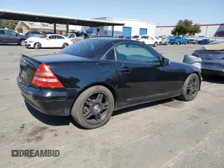 2001 Mercedes-Benz SLK-Class with VIN WDBKK65F71F175734, listed as a Copart auction lot 61874984 with 185,408 mi miles and Salvage Title. Bid and sale history available at carsss.com. Image 3.