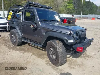 2020 Jeep Wrangler Sport S with VIN 1C4GJXAGXLW320279, listed as a IAAI auction lot 41958065 with 68,721 mi miles and . Bid and sale history available at DreamBid. Image 1.