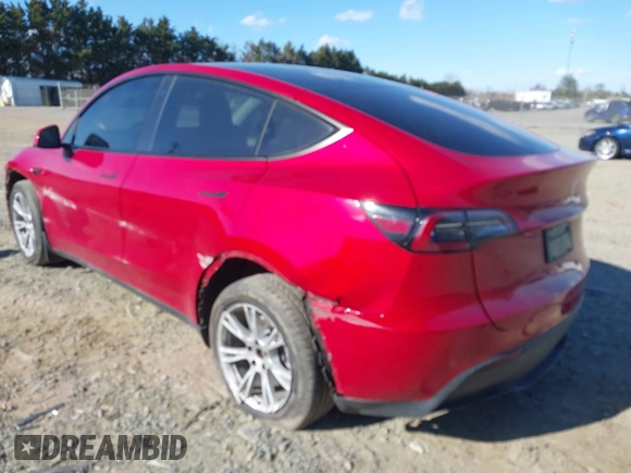 2023 Tesla Model Y Long Range with VIN 7SAYGDEE8PA121218, listed as a IAAI auction lot 41888923 with 34,796 mi miles. Bid and sale history available at carsss.com. Image 3.