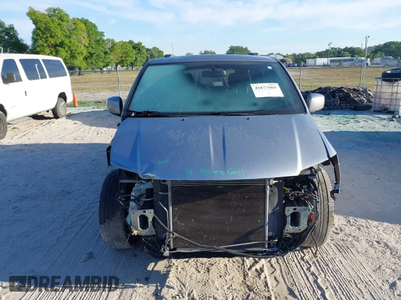2018 Dodge Grand Caravan SXT with VIN 2C4RDGCG5JR267428, listed as a IAAI auction lot 41877661 with 103,633 mi miles and . Bid and sale history available at DreamBid. Image 13.