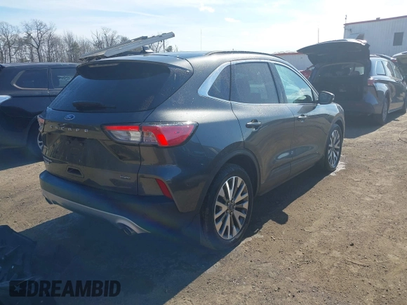 2020 Ford Escape Titanium Hybrid z VIN 1FMCU0DZ7LUB57978, wystawiony jako IAAI lot #41570242 z przebiegiem 32 819 mil mil oraz . Historia ofert i sprzedaży dostępna na DreamBid. Obrazek 4.