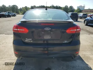 2016 Ford Focus SE z VIN 1FADP3F2XGL261707, wystawiony jako Copart lot #59078565 z przebiegiem 79 820 mil mil oraz Szkoda całkowita • Salvage title. Historia ofert i sprzedaży dostępna na DreamBid. Obrazek 6.