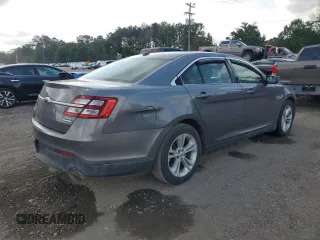 2014 Ford Taurus SEL with VIN 1FAHP2E84EG123006, listed as a Copart auction lot 53367795 with 216,092 mi miles and Salvage Title. Bid and sale history available at carsss.com. Image 3.