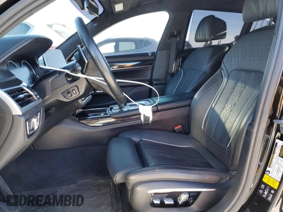 2016 BMW 7 Series 750i xDrive with VIN WBA7B0C50GG526899, listed as a Copart auction lot 46712485 with 97,985 mi miles and Salvage title. Bid and sale history available at DreamBid. Image 7.