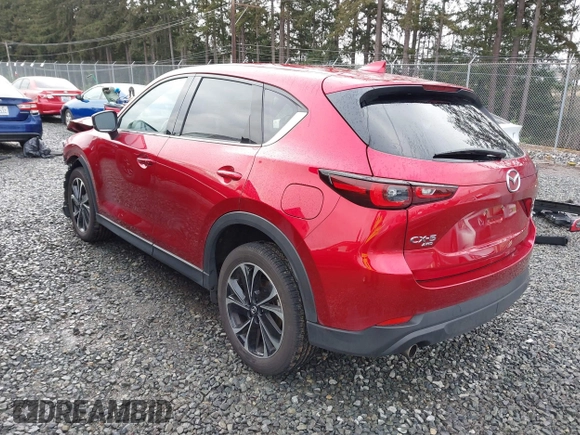 2023 Mazda CX-5 2.5 S Premium Package with VIN JM3KFBDM1P0161605, listed as a IAAI auction lot 41626777 with 26,581 mi miles. Bid and sale history available at carsss.com. Image 3.