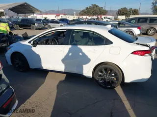 2024 Toyota Corolla Hybrid LE with VIN JTDBCMFE3R3044984, listed as a IAAI auction lot 41593723 with 1,702 mi miles. Bid and sale history available at carsss.com. Image 14.