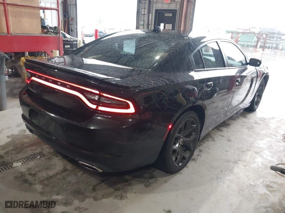 2019 Dodge Charger SXT with VIN 2C3CDXBG9KH635791, listed as a IAAI auction lot 40846926 with 161,714 mi miles. Bid and sale history available at carsss.com. Image 4.