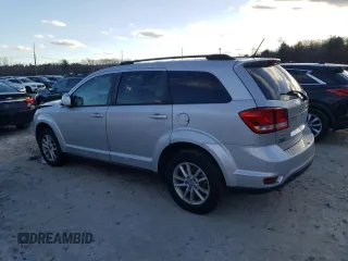 2014 Dodge Journey SXT z VIN 3C4PDDBG7ET282202, wystawiony jako Copart lot #82870614 z przebiegiem 153 404 mil mil oraz Czysty tytuł • Clean title. Historia ofert i sprzedaży dostępna na DreamBid. Obrazek 2.