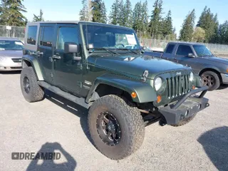 2007 Jeep Wrangler Unlimited Sahara z VIN 1J8GA59137L191872, wystawiony jako IAAI lot #42004541 z przebiegiem 180 479 mil mil oraz . Historia ofert i sprzedaży dostępna na DreamBid. Obrazek 1.