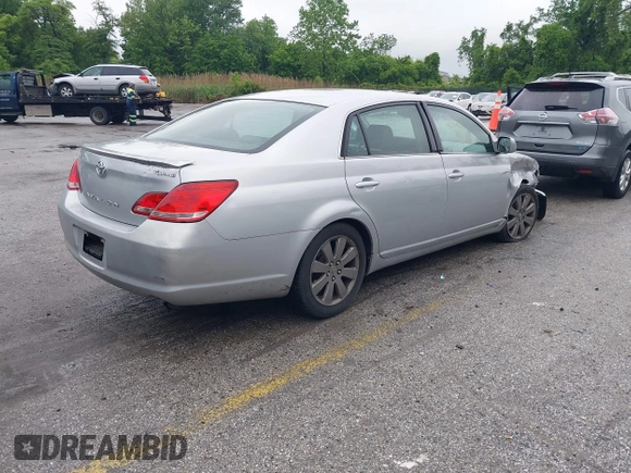 2007 Toyota Avalon XL z VIN 4T1BK36BX7U177246, wystawiony jako IAAI lot #42264311 z przebiegiem 183 324 mil mil oraz . Historia ofert i sprzedaży dostępna na DreamBid. Obrazek 4.