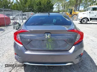 2021 Honda Civic Sedan EX with VIN 19XFC1F33ME012262, listed as a IAAI auction lot 41880047 with 67,861 mi miles. Bid and sale history available at carsss.com. Image 16.