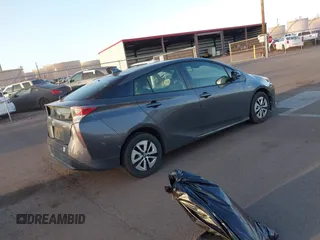 2018 Toyota Prius Two with VIN JTDKBRFU6J3582025, listed as a IAAI auction lot 41681244 with 77,504 mi miles and . Bid and sale history available at carsss.com. Image 4.