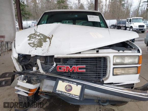 1998 GMC Yukon with VIN 1GKEK13R7WJ700881, listed as a IAAI auction lot 41507538 with 188,396 mi miles. Bid and sale history available at carsss.com. Image 6.
