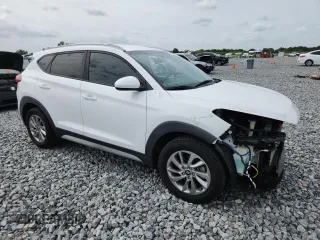2018 Hyundai Tucson SEL Plus z VIN KM8J33A41JU670631, wystawiony jako Copart lot #59887105 z przebiegiem 133 012 mil mil oraz Szkoda całkowita • Salvage title. Historia ofert i sprzedaży dostępna na DreamBid. Obrazek 4.