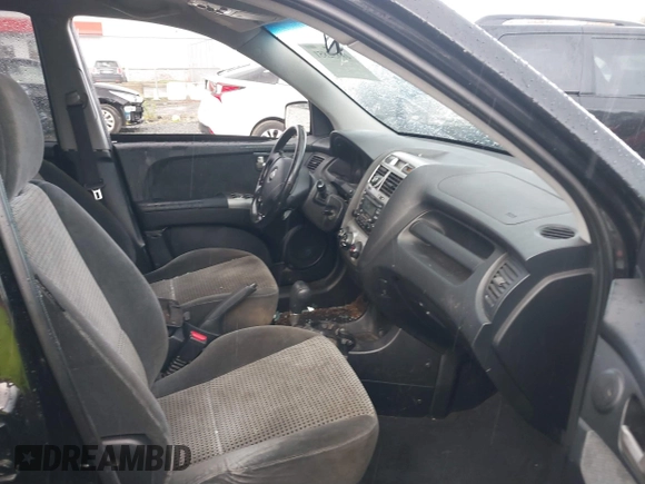2005 Kia Sportage LX with VIN KNDJF723557054234, listed as a IAAI auction lot 40652851 with 220,215 mi miles and . Bid and sale history available at carsss.com. Image 5.