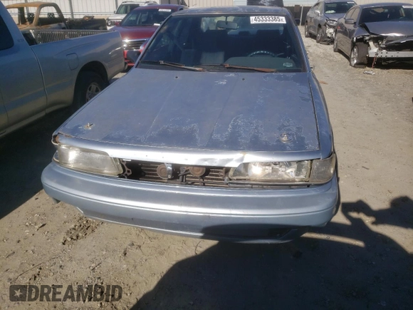 1991 Toyota Camry DLX z VIN 4T1SV21E2MU451022, wystawiony jako Copart lot #45333385 z przebiegiem 229 058 mil mil oraz Szkoda całkowita • Salvage title. Historia ofert i sprzedaży dostępna na DreamBid. Obrazek 5.