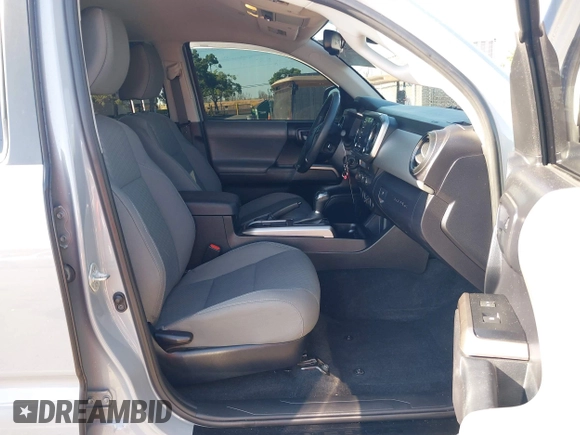 2021 Toyota Tacoma SR5 with VIN 5TFAZ5CN7MX101810, listed as a IAAI auction lot 42454418 with 58,930 mi miles and . Bid and sale history available at DreamBid. Image 5.