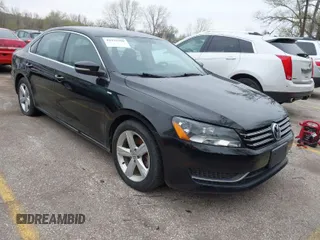 2014 Volkswagen Passat Wolfsburg Edition with VIN 1VWAS7A3XEC052934, listed as a IAAI auction lot 41935309 with 114,298 mi miles and . Bid and sale history available at DreamBid. Image 1.
