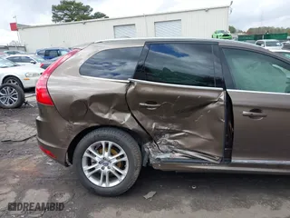 2015 Volvo XC60 T5 Drive-E Premier with VIN YV440MDK8F2681703, listed as a IAAI auction lot 41730228 with 112,738 mi miles. Bid and sale history available at carsss.com. Image 6.