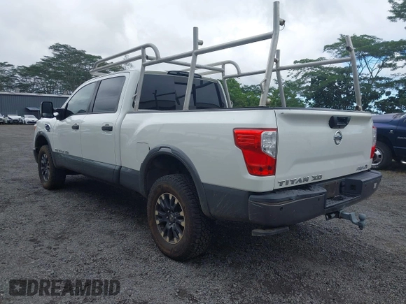 2017 Nissan Titan XD PRO-4X with VIN 1N6BA1F47HN517135, listed as a IAAI auction lot 41605323 with 108,984 mi miles. Bid and sale history available at carsss.com. Image 3.