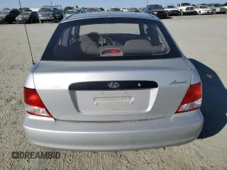 2002 Hyundai Accent с VIN KMHCF35G62U203274, выставлен на аукционе Copart как лот 77047834 с пробегом 90 442 миль миль и Списание • Salvage title. История ставок и продаж доступна на DreamBid. Изображение 6.