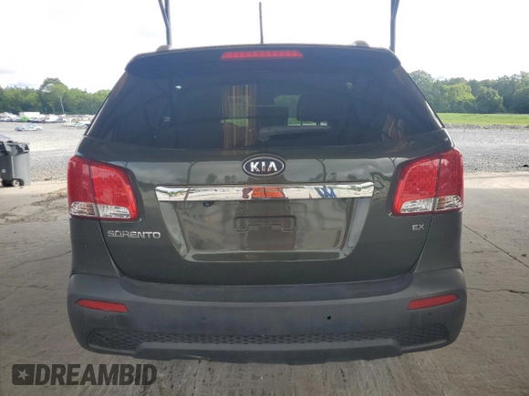 2012 Kia Sorento EX с VIN 5XYKU4A64CG261606, выставлен на аукционе Copart как лот 60863835 с пробегом 196 380 миль миль и Списание • Salvage title. История ставок и продаж доступна на DreamBid. Изображение 6.