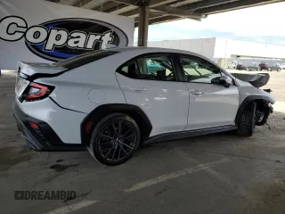 2023 Subaru WRX Premium z VIN JF1VBAF60P9812766, wystawiony jako Copart lot #55696695 z przebiegiem 25 894 mil mil oraz Szkoda całkowita • Salvage title. Historia ofert i sprzedaży dostępna na DreamBid. Obrazek 3.