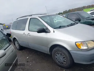 2003 Toyota Sienna CE with VIN 4T3ZF19C93U551570, listed as a IAAI auction lot 40961703 with 285,644 mi miles. Bid and sale history available at carsss.com. Image 13.