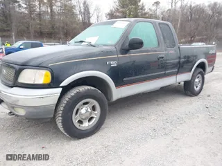 2000 Ford F-150 XL with VIN 1FTRX18L0YNC05663, listed as a IAAI auction lot 41413835 with 1 mi miles. Bid and sale history available at carsss.com. Image 2.