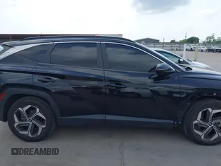 2022 Hyundai Tucson SEL with VIN 5NMJC3AE1NH012981, listed as a IAAI auction lot 41957812 with 38,284 mi miles and . Bid and sale history available at DreamBid. Image 14.