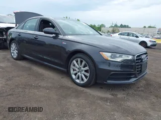 2014 Audi A6 Prestige z VIN WAUHGAFC2EN056017, wystawiony jako IAAI lot #42210095 z przebiegiem 149 143 mil mil oraz . Historia ofert i sprzedaży dostępna na DreamBid. Obrazek 1.