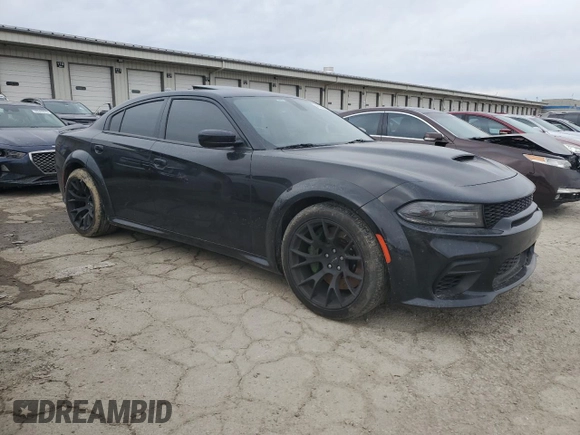 2021 Dodge Charger Scat Pack with VIN 2C3CDXGJ7MH584590, listed as a Copart auction lot 46396325 with 51,257 mi miles and Salvage Title. Bid and sale history available at DreamBid. Image 4.