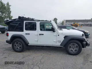 2021 Jeep Wrangler Unlimited Sport Altitude with VIN 1C4HJXDN5MW644613, listed as a IAAI auction lot 42466188 with 63,959 mi miles and . Bid and sale history available at DreamBid. Image 13.
