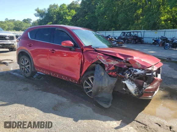 2018 Mazda CX-5 Grand Touring with VIN JM3KFADM9J0398036, listed as a Copart auction lot 62284145 with 118,827 mi miles and Salvage title. Bid and sale history available at DreamBid. Image 4.