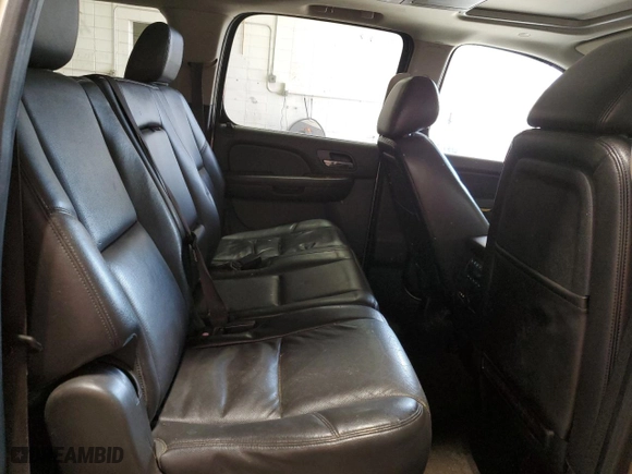2012 Chevrolet Suburban LTZ with VIN 1GNSKKE74CR325522, listed as a Copart auction lot 52215745 with 214,973 mi miles and Clean Title. Bid and sale history available at carsss.com. Image 11.