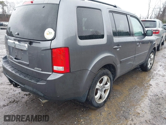 2015 Honda Pilot EX-L with VIN 5FNYF4H51FB064583, listed as a IAAI auction lot 41977746 with 120,398 mi miles and . Bid and sale history available at carsss.com. Image 4.