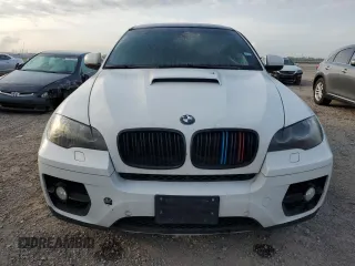 2012 BMW X6 50i z VIN 5UXFG8C59CL590549, wystawiony jako Copart lot #53071175 z przebiegiem 67 390 mil mil oraz Szkoda całkowita • Salvage title. Historia ofert i sprzedaży dostępna na DreamBid. Obrazek 5.