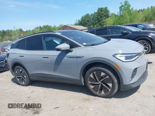 2022 Volkswagen ID.4 Pro S z VIN WVGGNPE24NP059968, wystawiony jako IAAI lot #42210089 z przebiegiem 36 860 mil mil oraz . Historia ofert i sprzedaży dostępna na DreamBid. Obrazek 13.