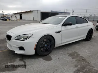 2017 BMW M6 with VIN WBS6E9C51HG437492, listed as a Copart auction lot 62424375 with 83,013 mi miles and Salvage title. Bid and sale history available at DreamBid. Image 1.