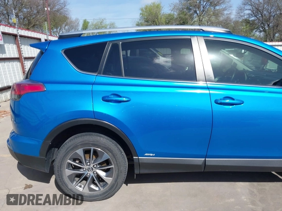 2016 Toyota RAV4 Hybrid XLE with VIN JTMRJREV5GD014170, listed as a IAAI auction lot 41822178 with 89,676 mi miles. Bid and sale history available at carsss.com. Image 19.