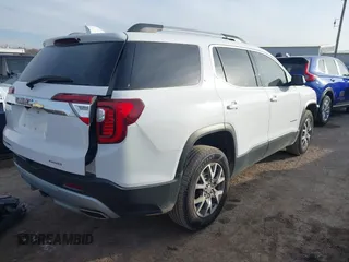 2020 GMC Acadia SLT with VIN 1GKKNULS0LZ136051, listed as a IAAI auction lot 41236862 with 59,176 mi miles and . Bid and sale history available at DreamBid. Image 4.