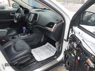 2016 Jeep Cherokee High Altitude with VIN 1C4PJLDB3GW160745, listed as a IAAI auction lot 41847482 with 125,180 mi miles. Bid and sale history available at carsss.com. Image 5.