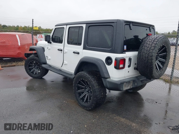 2019 Jeep Wrangler Unlimited Sport Altitude with VIN 1C4HJXDG3KW528647, listed as a IAAI auction lot 40986538 with 85,381 mi miles and . Bid and sale history available at DreamBid. Image 3.