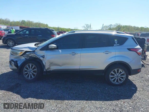 2018 Ford Escape Titanium with VIN 1FMCU9J96JUA33500, listed as a IAAI auction lot 42121736 with 105,430 mi miles and . Bid and sale history available at DreamBid. Image 14.